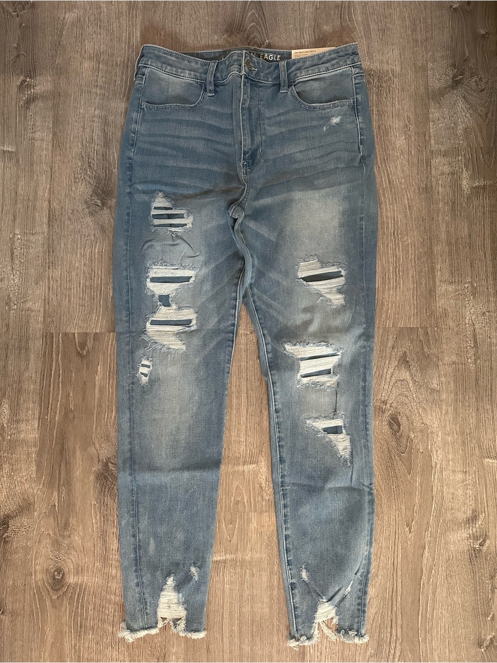 American Eagle Distressed Light Wash Super Hi-Rise Jegging